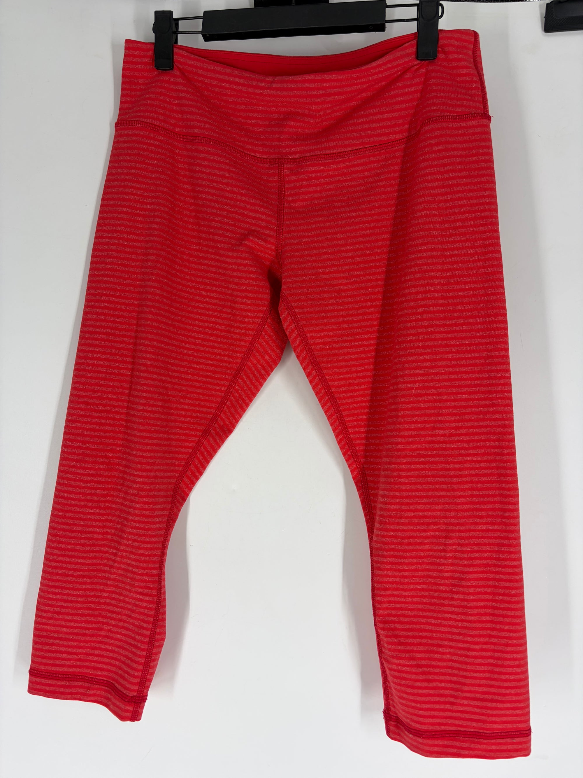salmon Lululemon striped leggings, 10