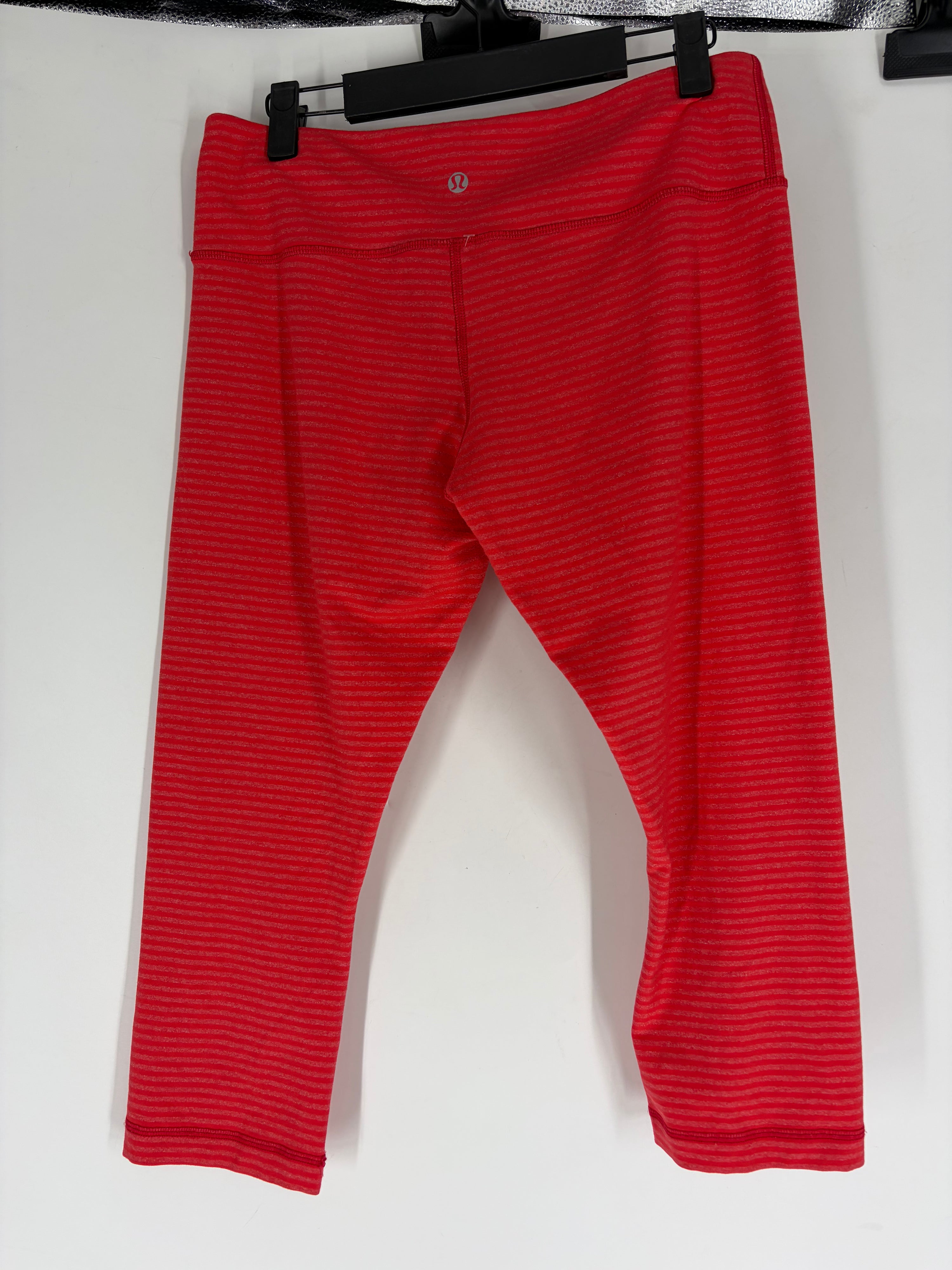 salmon Lululemon striped leggings, 10